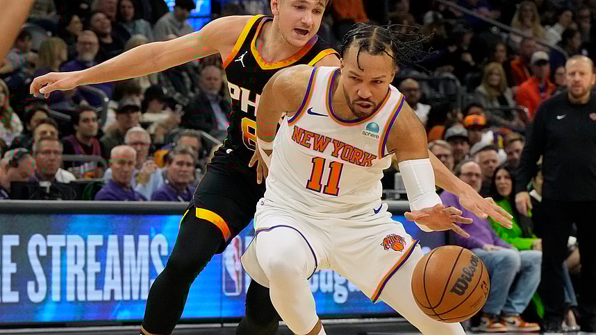 New York Knicks guard Jalen Brunson (11) drives on Phoenix Suns guard Grayson Allen (8) in the second half at Footprint Center