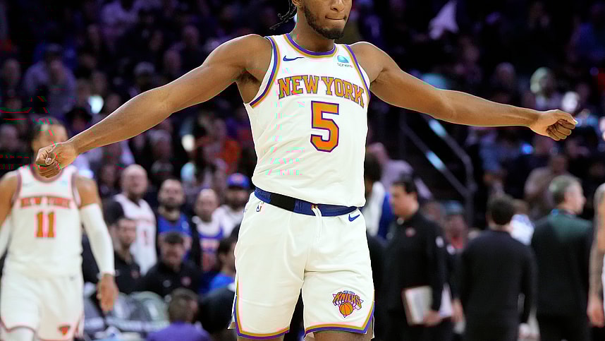 New York Knicks guard Immanuel Quickley (5) reacts to the crowd against the Phoenix Suns in the second half at Footprint Center