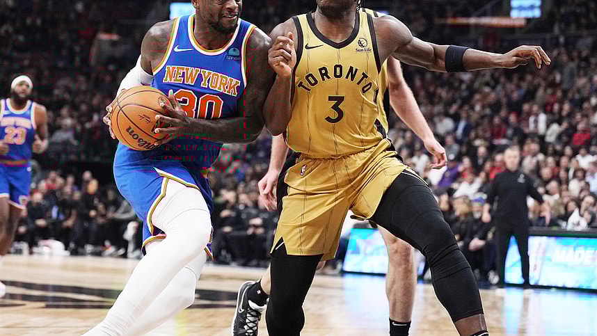 New York Knicks forward Julius Randle (30) controls the ball as Toronto Raptors forward O.G. Anunoby (3) tries to defend during the first quarter at Scotiabank Arena