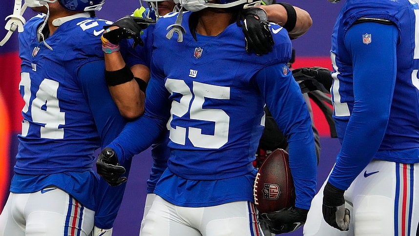 Nov 26, 2023; East Rutherford, New Jersey, USA; New York Giants cornerback Deonte Banks (25) celebrates an interception against New England Patriots in the 1st half at MetLife Stadium. Mandatory Credit: Robert Deutsch-USA TODAY Sports