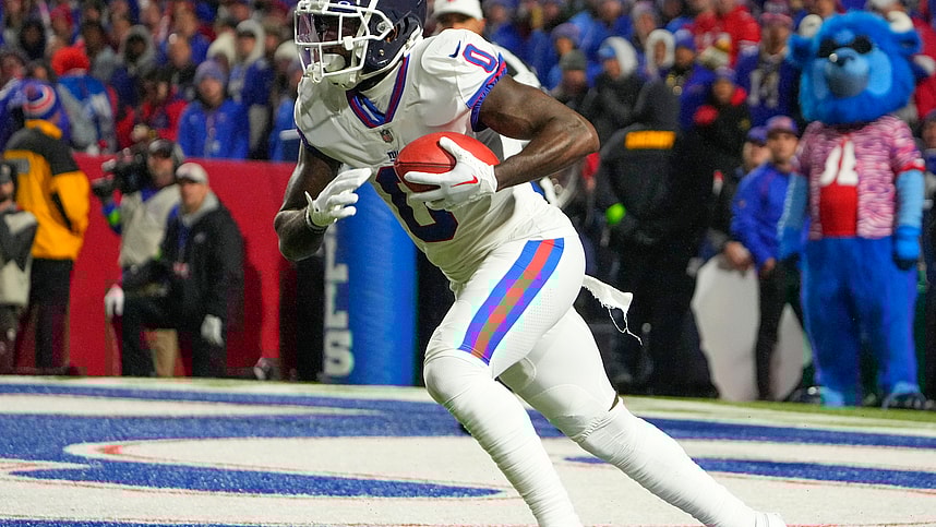 New York Giants wide receiver Parris Campbell (0) runs back a kick off against the Buffalo Bills during the second half at Highmark Stadium