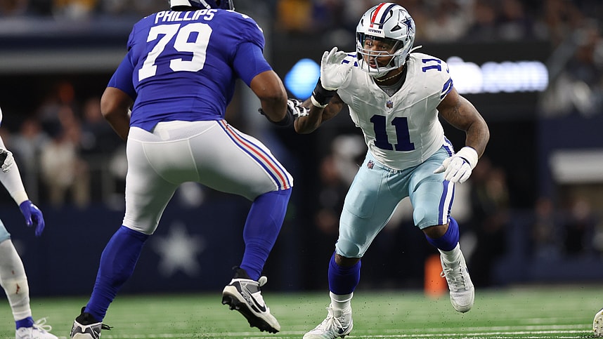Dallas Cowboys linebacker Micah Parsons (11) rushes against New York Giants offensive tackle Tyre Phillips (79) during the game