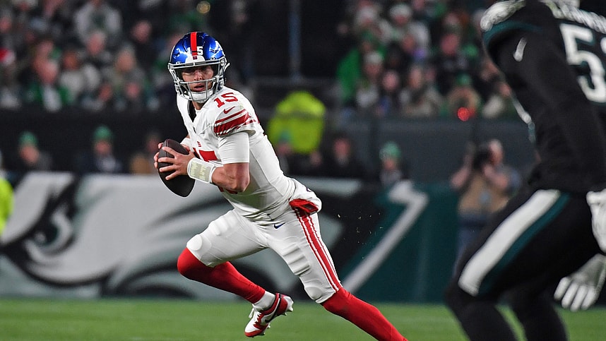 New York Giants quarterback Tommy DeVito (15) looks for a receiver against the Philadelphia Eagles during the second quarter at Lincoln Financial Field