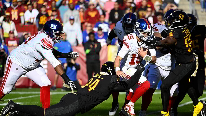 Washington Commanders defensive tackle Daron Payne (94) sacks New York Giants quarterback Tommy DeVito (15) during the first half at FedExField