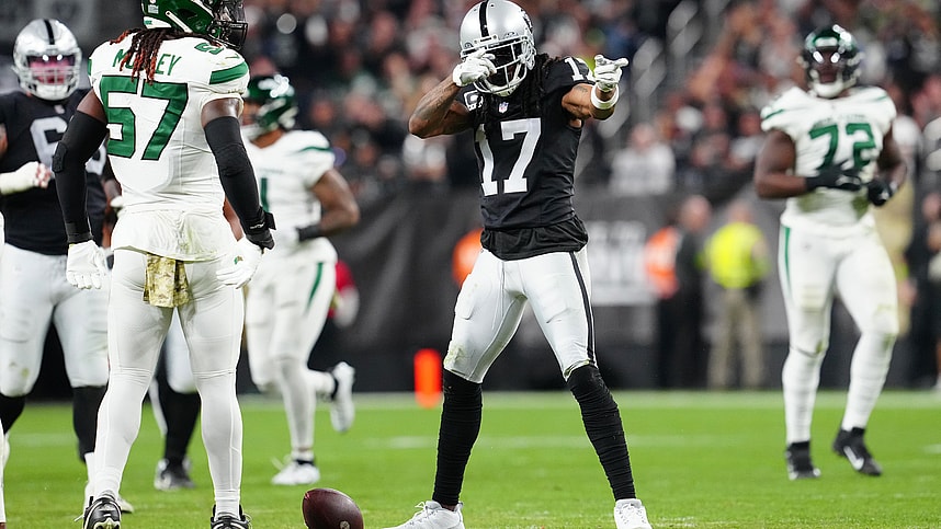 Las Vegas Raiders wide receiver Davante Adams (17) gestures after gaining a first down against the New York Jets during the second quarter at Allegiant Stadium