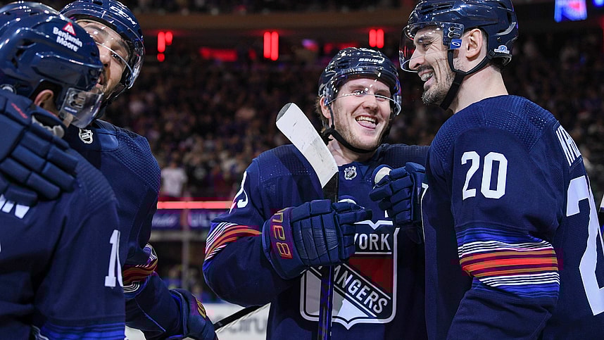 New York Rangers defenseman Adam Fox (23) and New York Rangers left wing Chris Kreider (20) celebrate the goal by New York Rangers left wing Artemi Panarin (10) against the Buffalo Sabres during the first period at Madison Square Garden