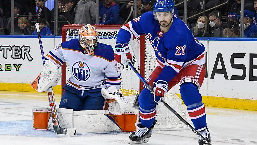 New York Rangers left wing Chris Kreider (20) plays the puck in front of Edmonton Oilers goaltender Stuart Skinner (74) during the second period at Madison Square Garden