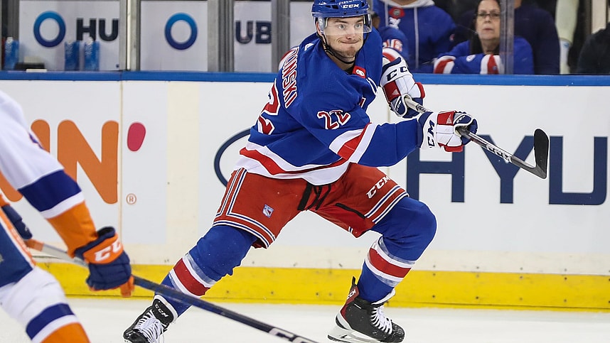 New York Rangers center Jonny Brodzinski (22) passes the puck in the first period against the New York Islanders at Madison Square Garden