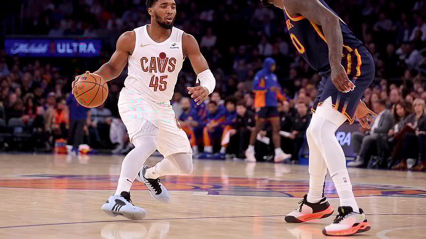 Cleveland Cavaliers guard Donovan Mitchell (45) controls the ball against New York Knicks forward Julius Randle (30) during the first quarter at Madison Square Garden