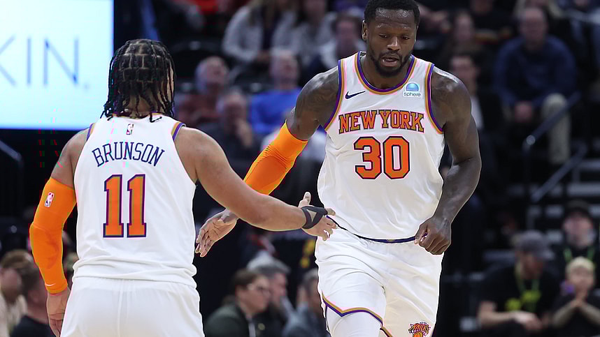 New York Knicks forward Julius Randle (30) and guard Jalen Brunson (11) react to a play against the Utah Jazz during the third quarter at Delta Center