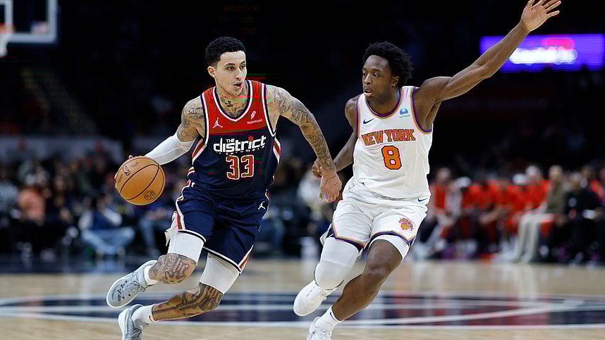 Washington Wizards forward Kyle Kuzma (33) drives to the basket as New York Knicks forward OG Anunoby (8) defends in the third quarter at Capital One Arena