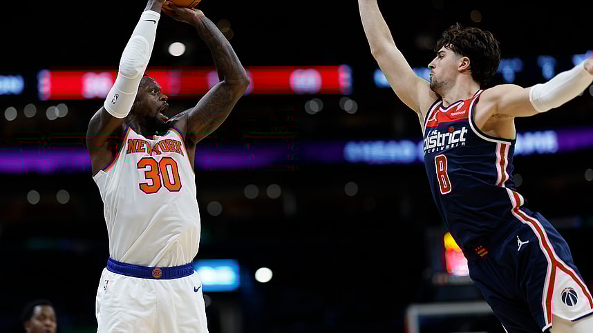 New York Knicks forward Julius Randle (30) shoots the ball over Washington Wizards forward Deni Avdija (8) in the second quarter at Capital One Arena