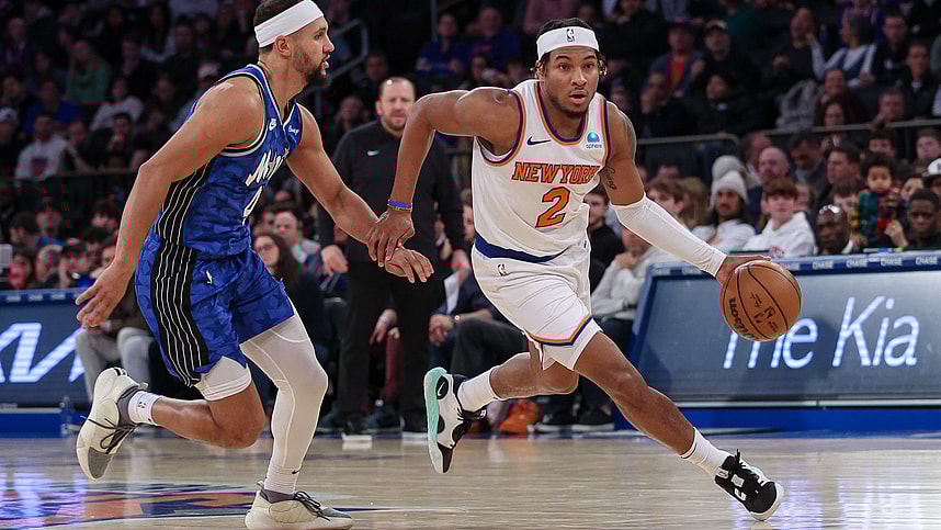 New York Knicks guard Miles McBride (2) dribbles against Orlando Magic guard Jalen Suggs (4) during the second half at Madison Square Garden