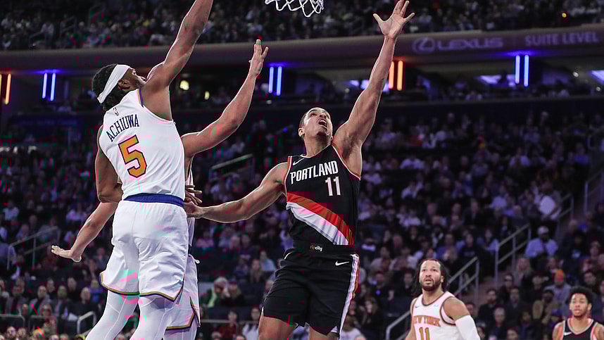 Portland Trail Blazers guard Malcolm Brogdon (11) drives past New York Knicks forward Precious Achiuwa (5) for layup in the second quarter at Madison Square Garden