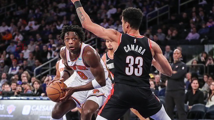 New York Knicks forward OG Anunoby (8) looks to drive past Portland Trail Blazers forward Toumani Camara (33) in the fourth quarter at Madison Square Garden