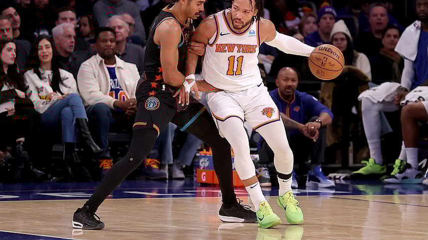 New York Knicks guard Jalen Brunson (11) controls the ball against Washington Wizards guard Jordan Poole (13) during the fourth quarter at Madison Square Garden