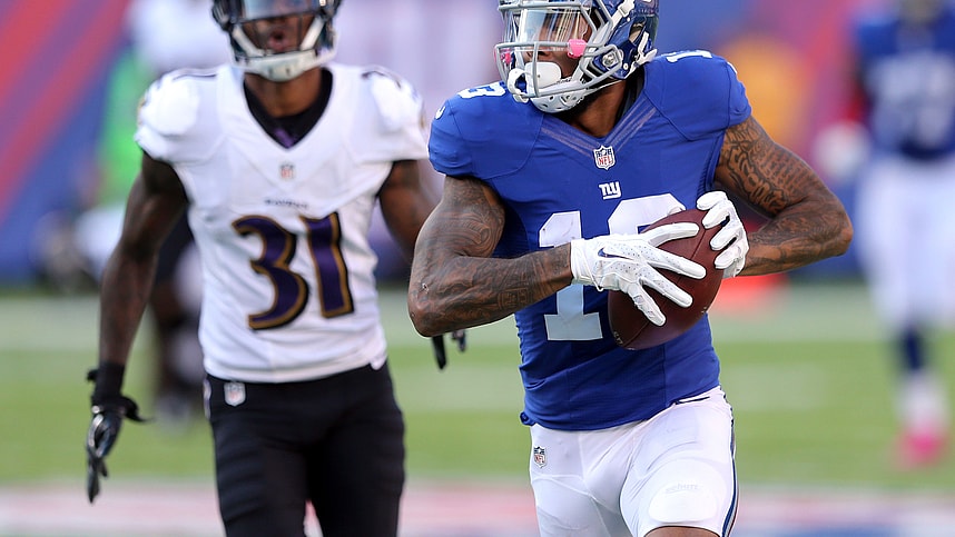 New York Giants wide receiver Odell Beckham Jr. (13) runs for a touchdown against Baltimore Ravens corner back Will Davis (31) during the fourth quarter at MetLife Stadium