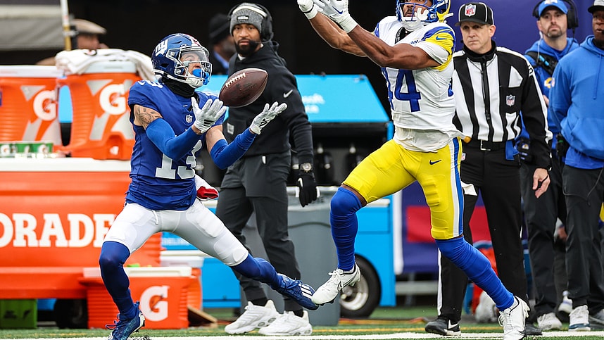 New York Giants wide receiver Jalin Hyatt (13) attempts to catch a pass as Los Angeles Rams cornerback Ahkello Witherspoon (44) defends during the first half at MetLife Stadium