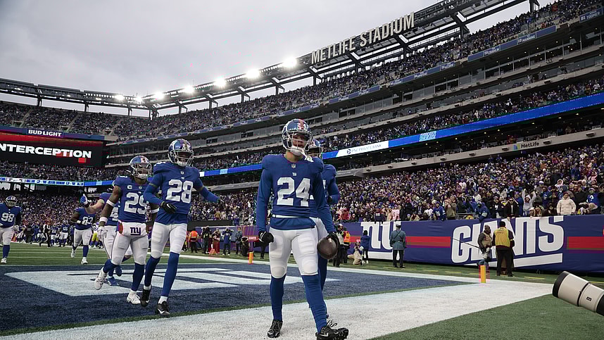 New York Giants safety Dane Belton (24) celebrates with teammates after an interception during the second half against the Los Angeles Rams at MetLife Stadium