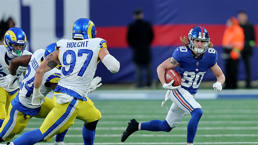 New York Giants wide receiver Gunner Olszewski (80) returns a punt against Los Angeles Rams linebacker Michael Hoecht (97) and running back Royce Freeman (24) during the fourth quarter at MetLife Stadium