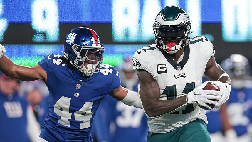 Philadelphia Eagles wide receiver A.J. Brown (11) catches the ball as New York Giants cornerback Nick McCloud (44) pursues during the first quarter at MetLife Stadium