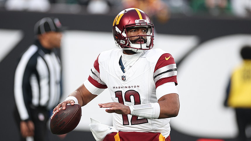 Washington Commanders quarterback Jacoby Brissett (12) throws the ball during the second half against the New York Jets at MetLife Stadium