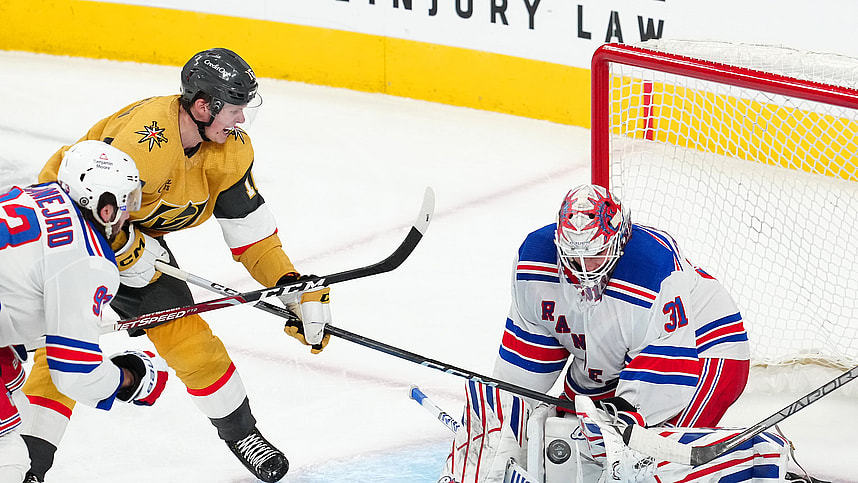New York Rangers goaltender Igor Shesterkin (31) makes a save as Vegas Golden Knights left wing Pavel Dorofeyev (16) attempts a deflection during the third period at T-Mobile Arena