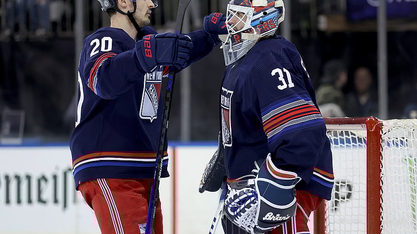 New York Rangers left wing Chris Kreider (20) hugs goaltender Igor Shesterkin (31) after defeating the Washington Capitals at Madison Square Garden