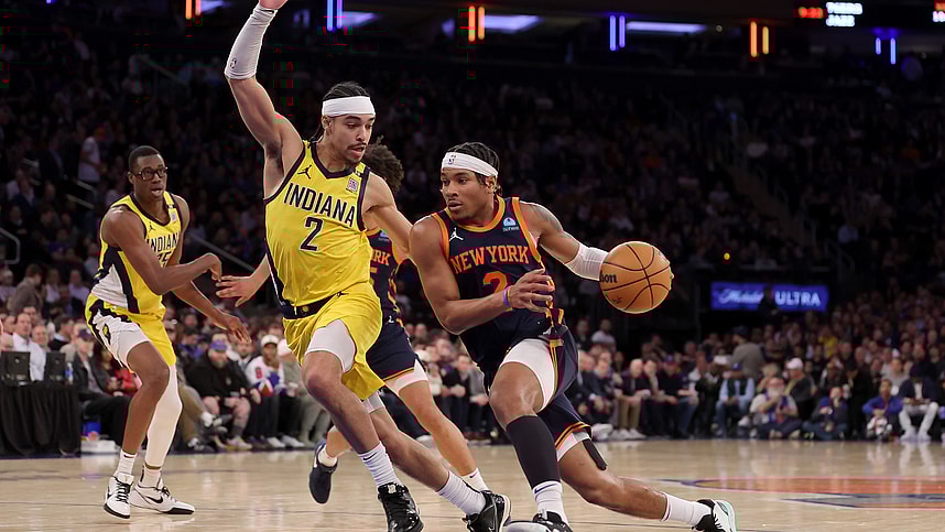 New York Knicks guard Miles McBride (2) drives to the basket against Indiana Pacers guard Andrew Nembhard (2) during the fourth quarter at Madison Square Garden