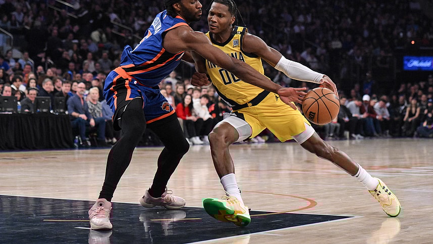 Indiana Pacers guard Bennedict Mathurin (00) drives to the basket while being defended by New York Knicks forward Precious Achiuwa (5) during the first quarter at Madison Square Garden