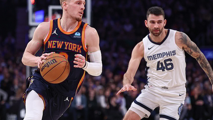 New York Knicks guard Donte DiVincenzo (0) dribbles in front of Memphis Grizzlies guard John Konchar (46) during the first half at Madison Square Garden