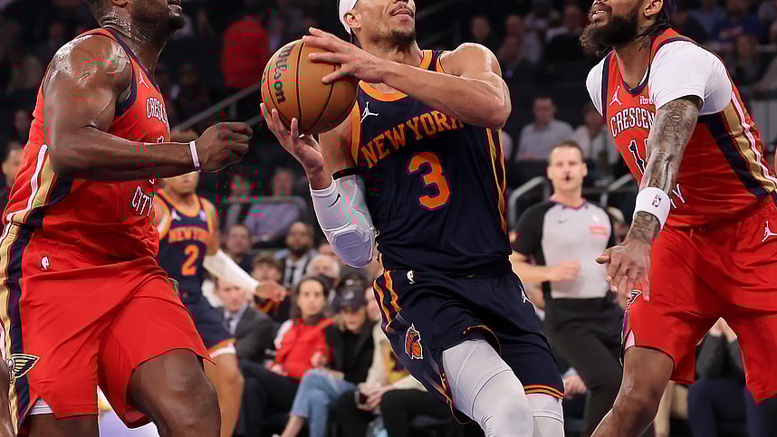 New York Knicks guard Josh Hart (3) drives to the basket against New Orleans Pelicans forwards Zion Williamson (1) and Brandon Ingram (14) during the first quarter at Madison Square Garden