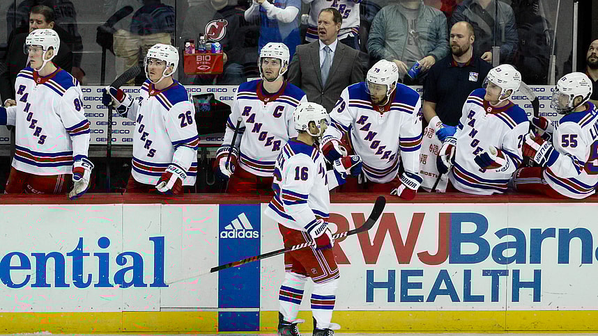 New York Rangers center Vincent Trocheck (16) celebrates with teammates after scoring a goal against the New Jersey Devils during the third period at Prudential Center
