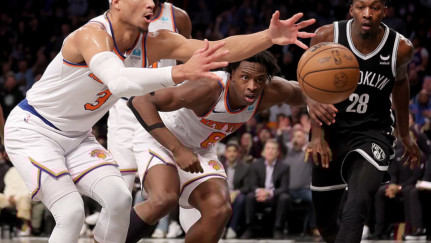 New York Knicks guard Josh Hart (3) and forward OG Anunoby (8) chase a loose ball against Brooklyn Nets forward Dorian Finney-Smith (28) during the fourth quarter at Barclays Center