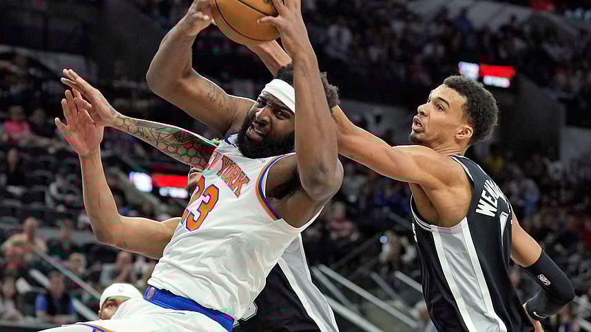 New York Knicks center Mitchell Robinson (23) takes rebound away from San Antonio Spurs forward Victor Wembanyama (1) during the first half at Frost Bank Center