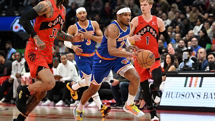 New York Knicks guard Miles McBride (2) dribbles the ball against the Toronto Raptors in the first half at Scotiabank Arena