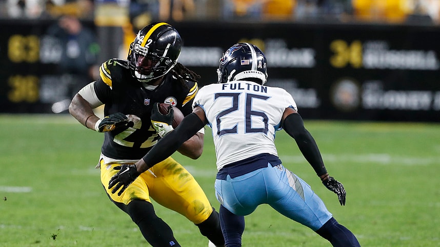 Pittsburgh Steelers running back Najee Harris (22) runs against Tennessee Titans cornerback Kristian Fulton (26) (New York Giants target) during the third quarter at Acrisure Stadium