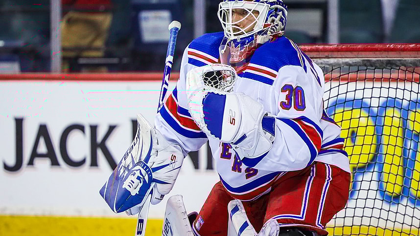 New York Rangers goaltender Henrik Lundqvist (30) guards his net during the warmup period before a game against the Calgary Flames at Scotiabank Saddledome
