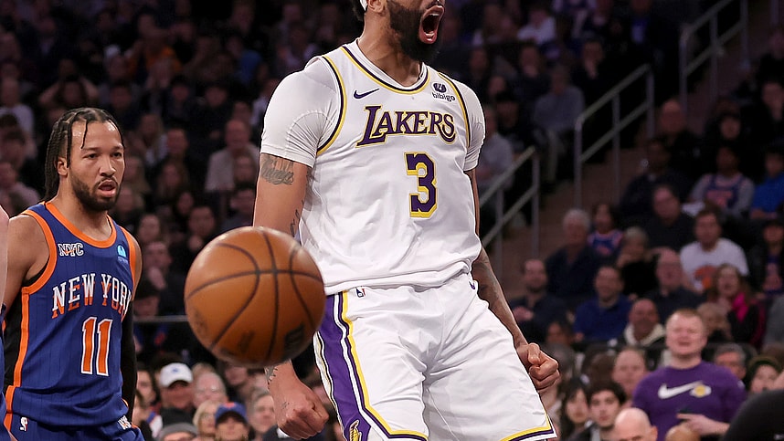 Los Angeles Lakers forward Anthony Davis (3) reacts after a dunk against New York Knicks guard Jalen Brunson (11) during the first quarter at Madison Square Garden