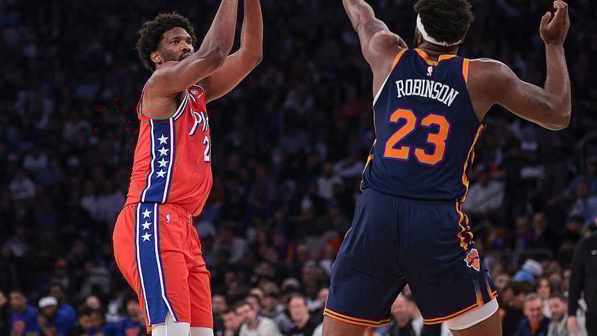 Apr 22, 2024; New York, New York, USA; Philadelphia 76ers center Joel Embiid (21) shoots the ball as New York Knicks center Mitchell Robinson (23) defends during the first half during game two of the first round for the 2024 NBA playoffs at Madison Square Garden. Mandatory Credit: Vincent Carchietta-USA TODAY Sports