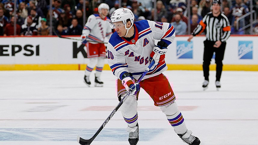 New York Rangers left wing Artemi Panarin (10) controls the puck in the third period against the Colorado Avalanche at Ball Arena