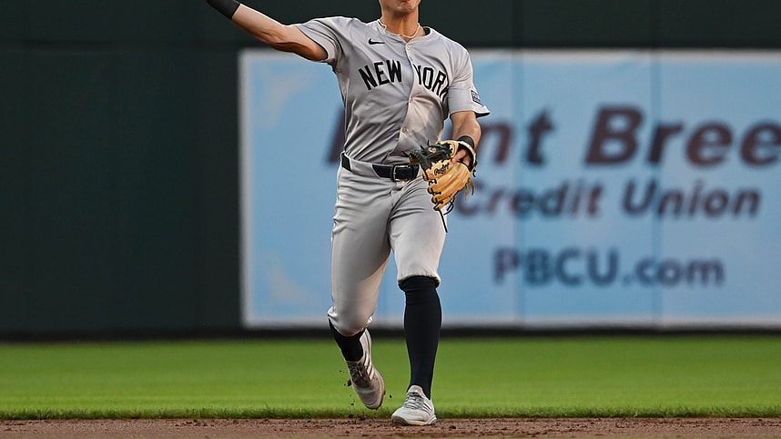 May 1, 2024; Baltimore, Maryland, USA; New York Yankees shortstop Anthony Volpe (11) throws to first base during the first inning against the Baltimore Orioles at Oriole Park at Camden Yards. Mandatory Credit: Tommy Gilligan-USA TODAY Sports