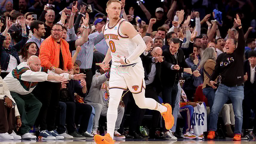 May 6, 2024; New York, New York, USA; New York Knicks guard Donte DiVincenzo (0) celebrates his three point shot against the Indiana Pacers during the fourth quarter of game one of the second round of the 2024 NBA playoffs at Madison Square Garden. Mandatory Credit: Brad Penner-USA TODAY Sports