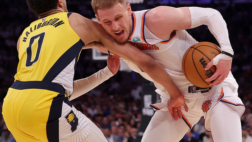 May 19, 2024; New York, New York, USA; New York Knicks guard Donte DiVincenzo (0) is fouled by Indiana Pacers guard Tyrese Haliburton (0) during the fourth quarter of game seven of the second round of the 2024 NBA playoffs at Madison Square Garden. Mandatory Credit: Brad Penner-USA TODAY Sports