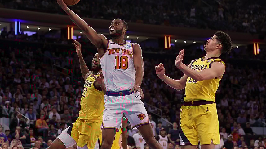 May 19, 2024; New York, New York, USA; New York Knicks guard Alec Burks (18) drives to the basket against Indiana Pacers forward Isaiah Jackson (22) and guard Ben Sheppard (26) during the fourth quarter of game seven of the second round of the 2024 NBA playoffs at Madison Square Garden. Mandatory Credit: Brad Penner-USA TODAY Sports