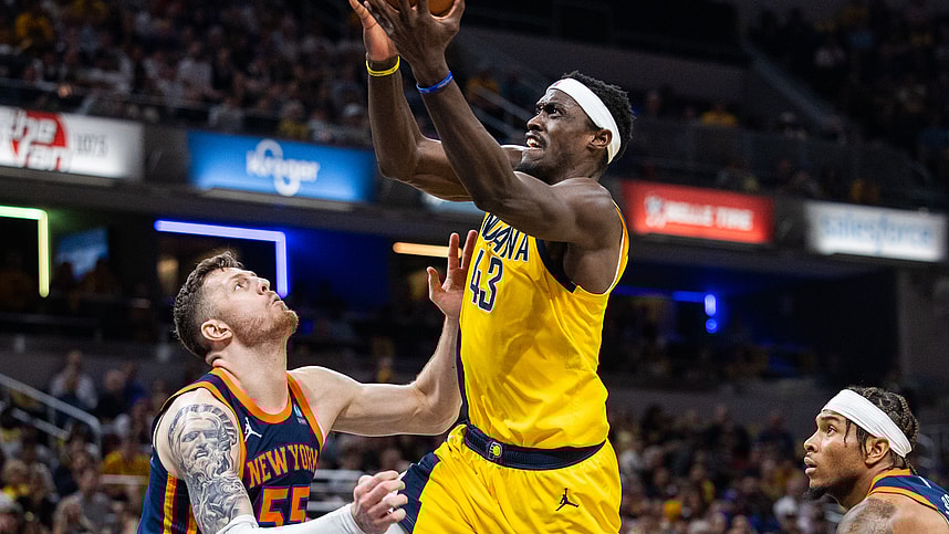 May 12, 2024; Indianapolis, Indiana, USA; Indiana Pacers forward Pascal Siakam (43) shoots the ball while New York Knicks center Isaiah Hartenstein (55) defends during game four of the second round for the 2024 NBA playoffs at Gainbridge Fieldhouse. Mandatory Credit: Trevor Ruszkowski-USA TODAY Sports