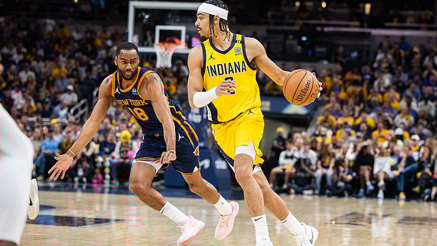 May 12, 2024; Indianapolis, Indiana, USA; Indiana Pacers guard Andrew Nembhard (2) dribbles the ball while New York Knicks guard Alec Burks (18) defends during game four of the second round for the 2024 NBA playoffs at Gainbridge Fieldhouse. Mandatory Credit: Trevor Ruszkowski-USA TODAY Sports