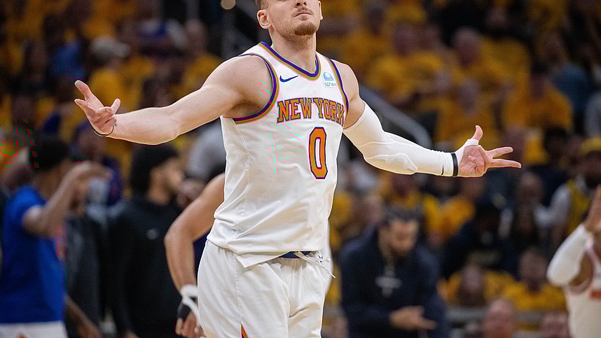 May 17, 2024; Indianapolis, Indiana, USA; New York Knicks guard Donte DiVincenzo (0) reacts after a made basket during game six of the second round for the 2024 NBA playoffs against the Indiana Pacers at Gainbridge Fieldhouse. Mandatory Credit: Trevor Ruszkowski-USA TODAY Sports