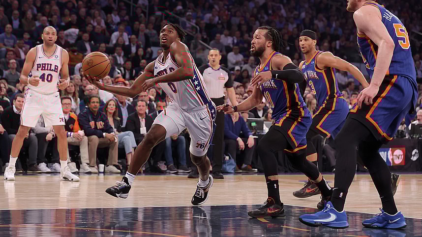 Apr 30, 2024; New York, New York, USA; Philadelphia 76ers guard Tyrese Maxey (0) drives to the basket against New York Knicks guards Jalen Brunson (11) and Josh Hart (3) and center Isaiah Hartenstein (55) during the first quarter of game 5 of the first round of the 2024 NBA playoffs at Madison Square Garden. Mandatory Credit: Brad Penner-USA TODAY Sports