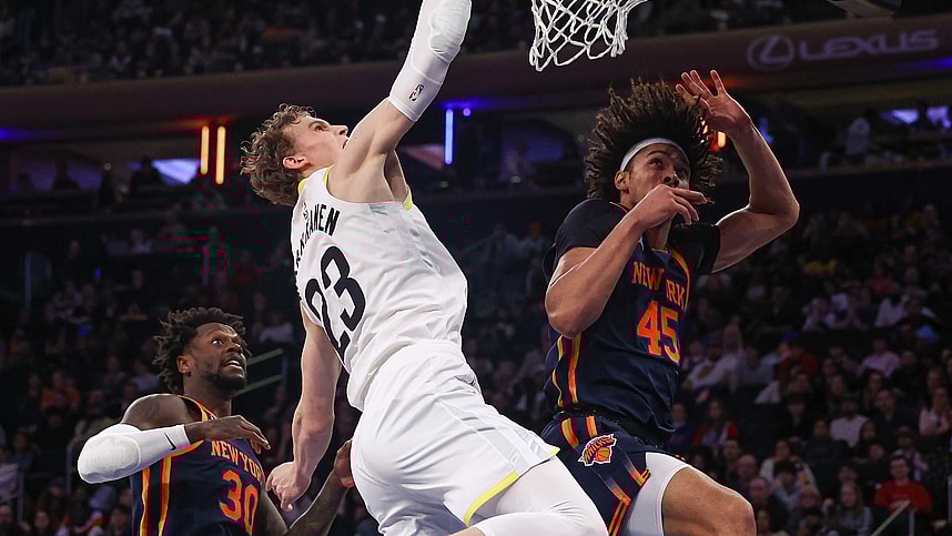Feb 11, 2023; New York, New York, USA; Utah Jazz forward Lauri Markkanen (23) dunks the ball against New York Knicks center Jericho Sims (45) and forward Julius Randle (30) during the second half at Madison Square Garden. Mandatory Credit: Vincent Carchietta-USA TODAY Sports